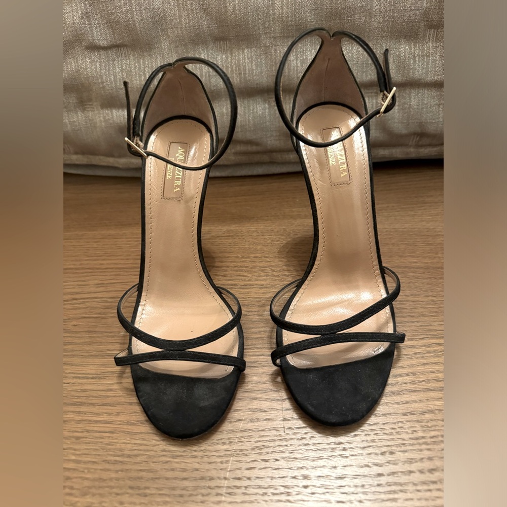 Aquazurra strappy black heeled sandals.
